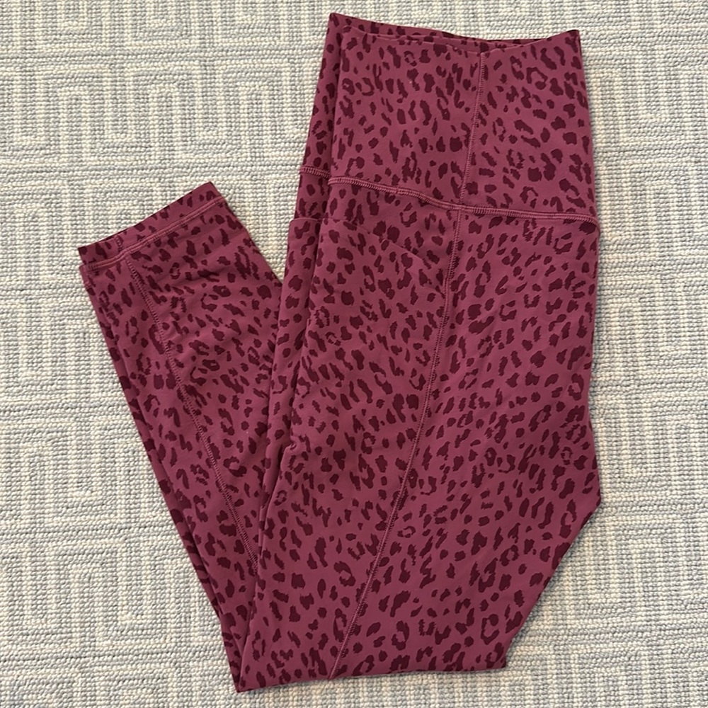 Athleta SZ M Salutation Stash Legging pink leopard